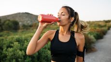 Woman drinking from a water bottle