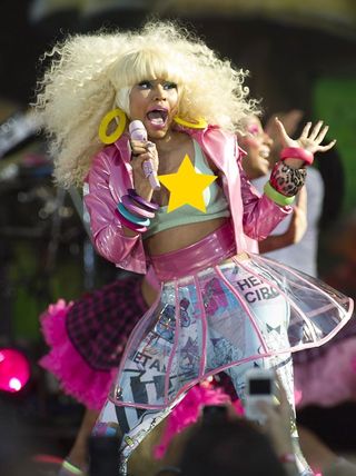 Nicki Minaj performing on stage.