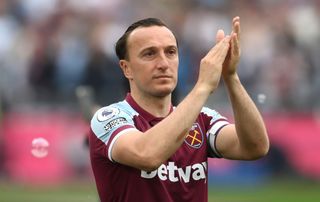 Mark Noble of West Ham United interacts with the crowd following their final Home Game for West Ham United during the Premier League match between West Ham United and Manchester City at London Stadium on May 15, 2022 in London, England.