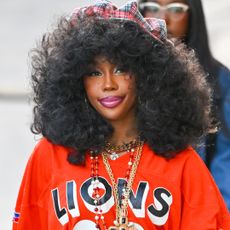 SZA styled an ultra-baggy set with Vans sneakers in Paris