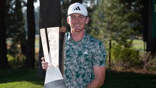 Nick Dunlap with The American Express trophy