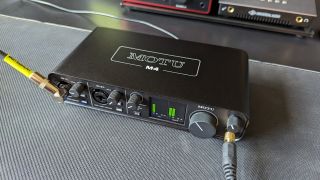 A Motu M4 audio interface on a desktop