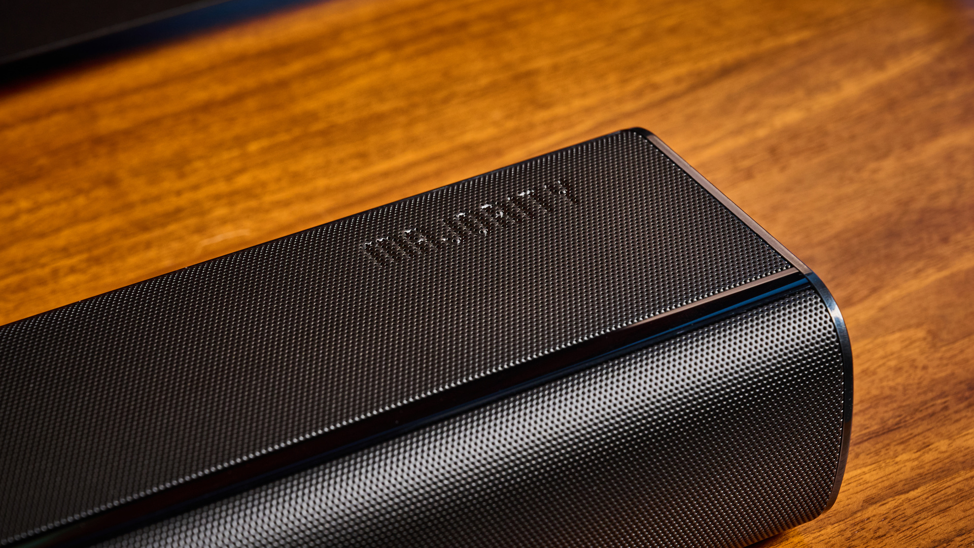 the budget majority naga 60 soundbar in black, showing its buttons and remote