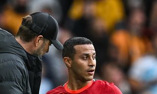 Jurgen Klopp with Thiago during Liverpool's Premier League game against Wolves..