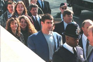 Manchester United's Eric Cantona attends his trial in March 1995 following a "kung fu" kick on an abusive Crystal Palace fan in January of that year.