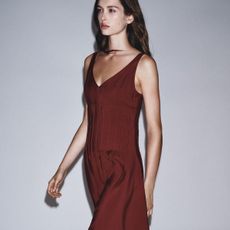 Woman in maroon dress