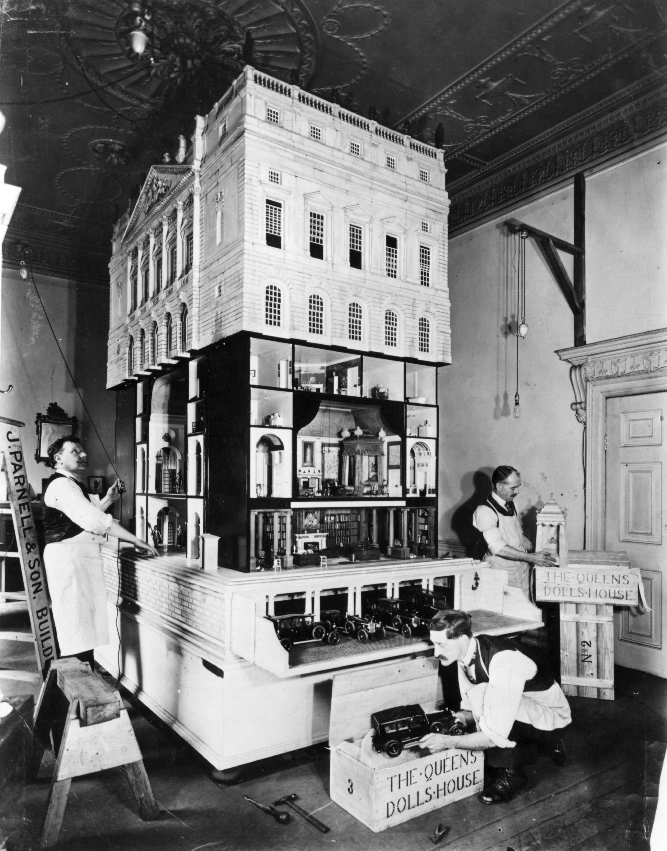 Queen Mary's Doll House, designed by Sir Edwin Lutyens, is packed up in readiness for despatch to Windsor.