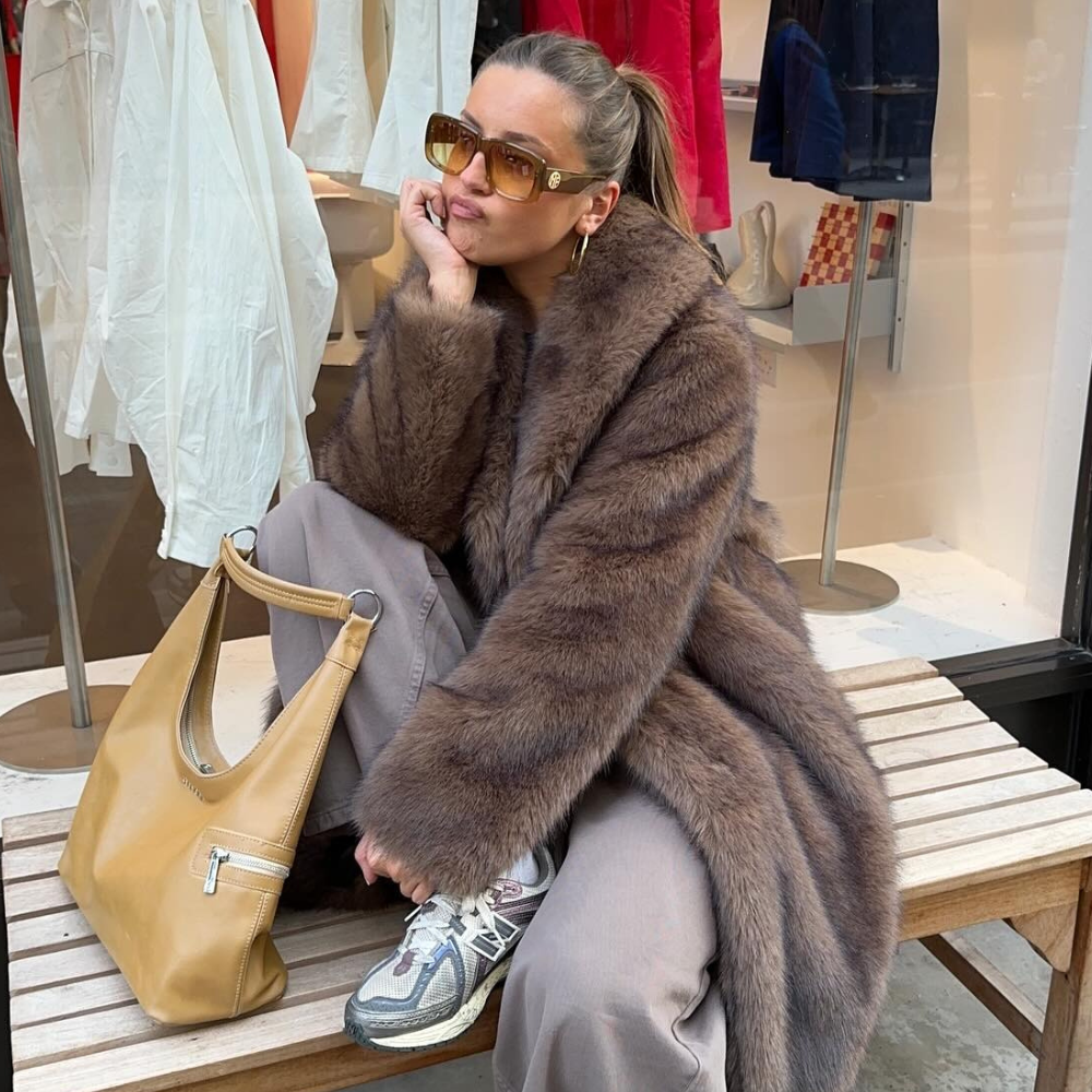 Fashion person Olivia Herring wears London winter shoe trends 2025