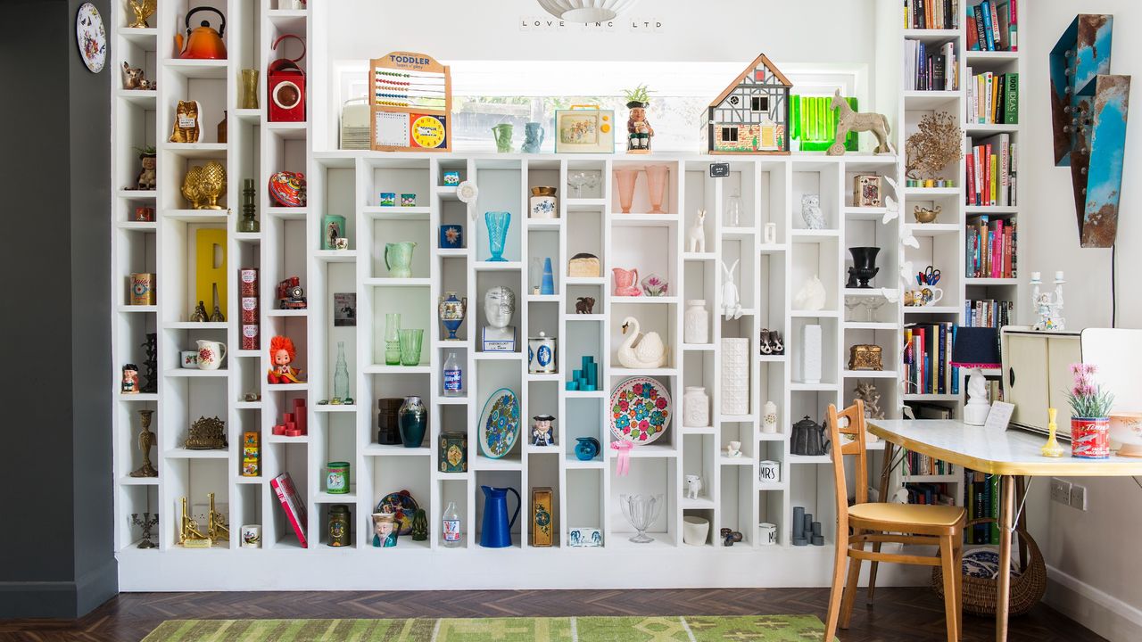 A large shelving unit filled with colourful decorative items