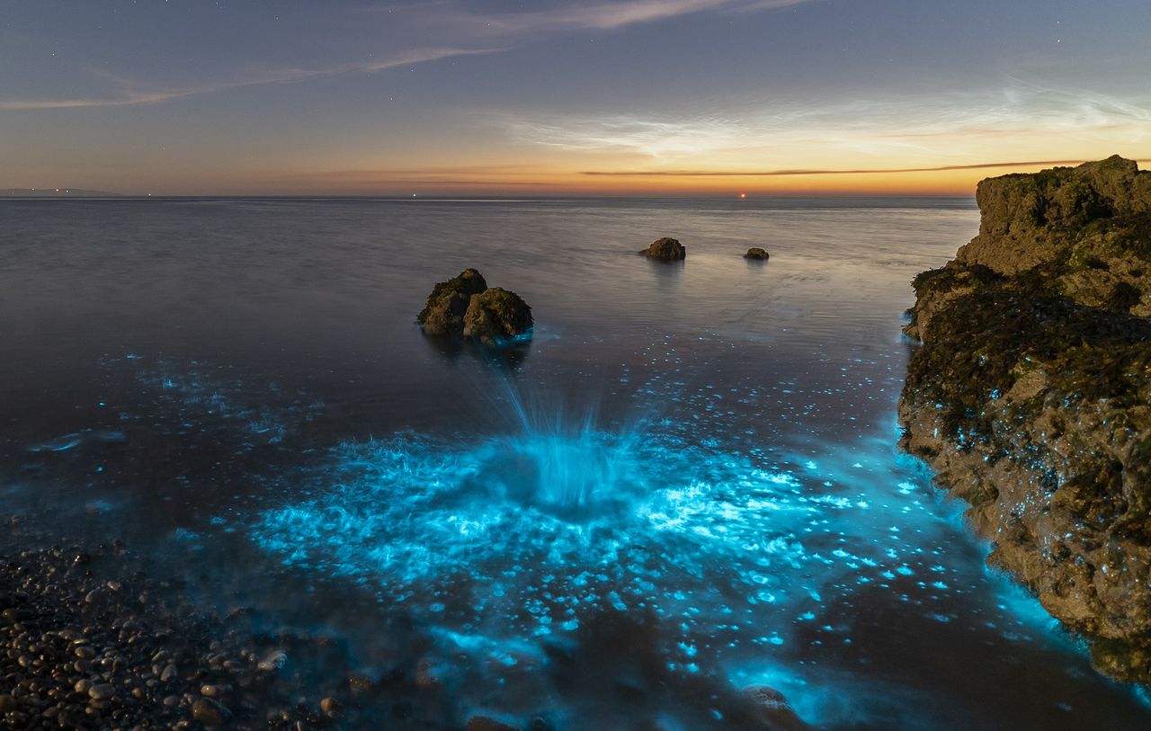 A splash of light in the darkness at Penmon Point, Anglesey.