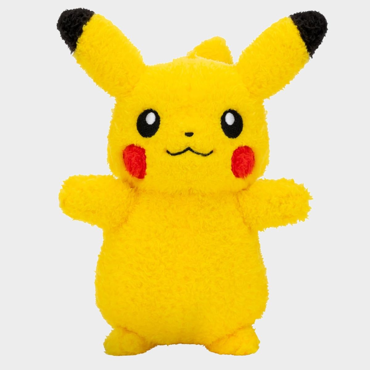 Pikachu soft toy on a plain background