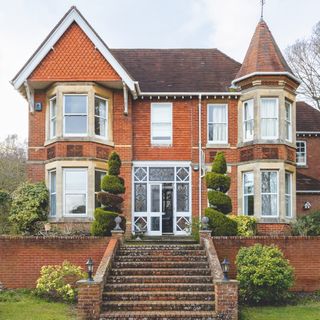 Surrey Victorian house decorated in neutral shades with vintage furniture