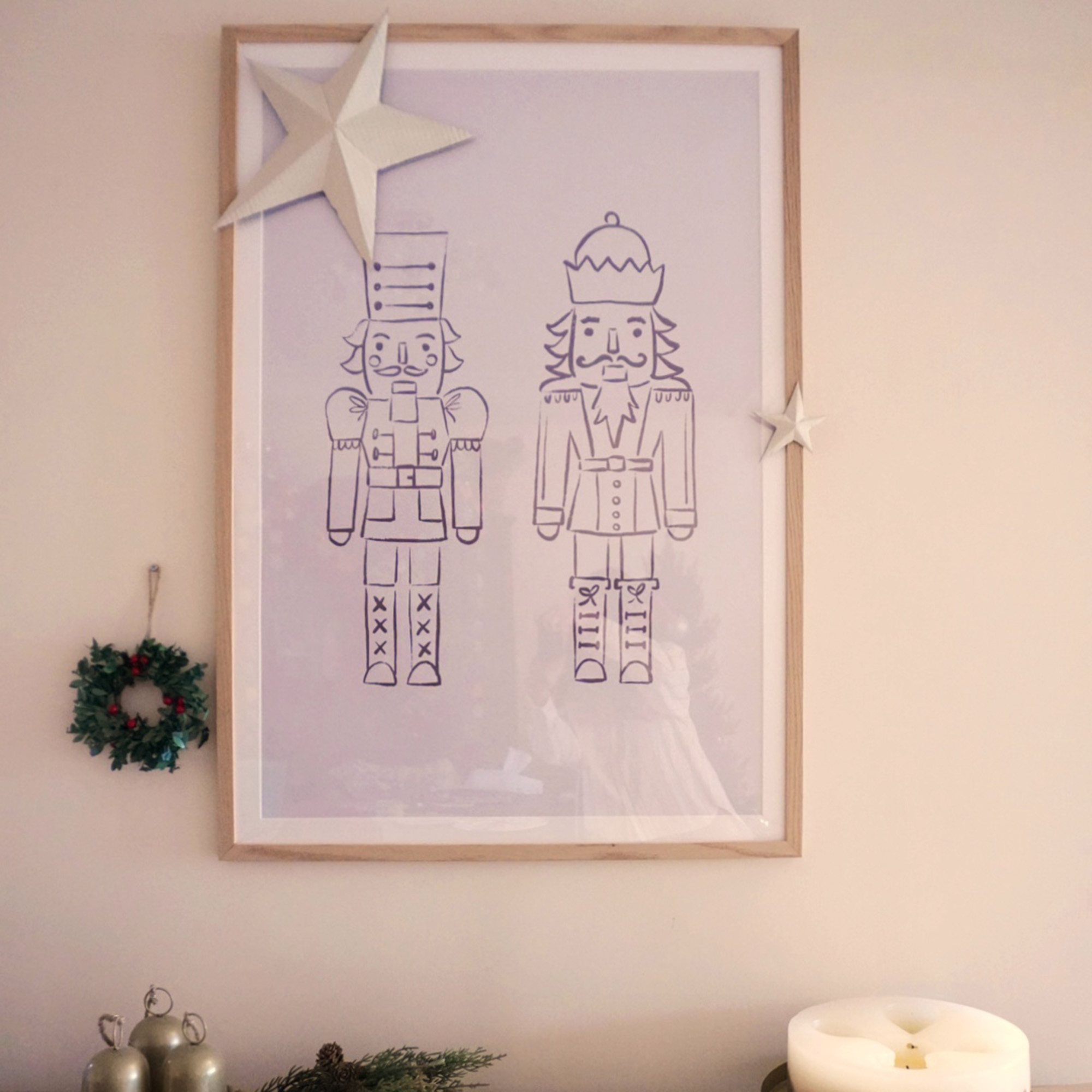 large 3d star hung over a christmas painting