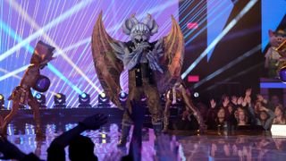 Gargoyle performs during the Battle of the Saved on The Masked Singer season 9