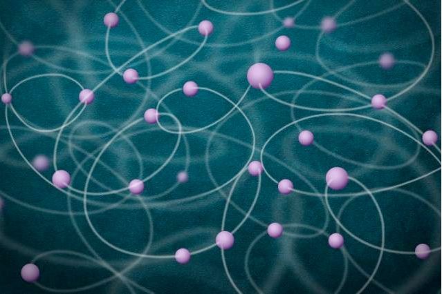 an illustration showing a large number of atoms (purple) mutually entangled with one another.