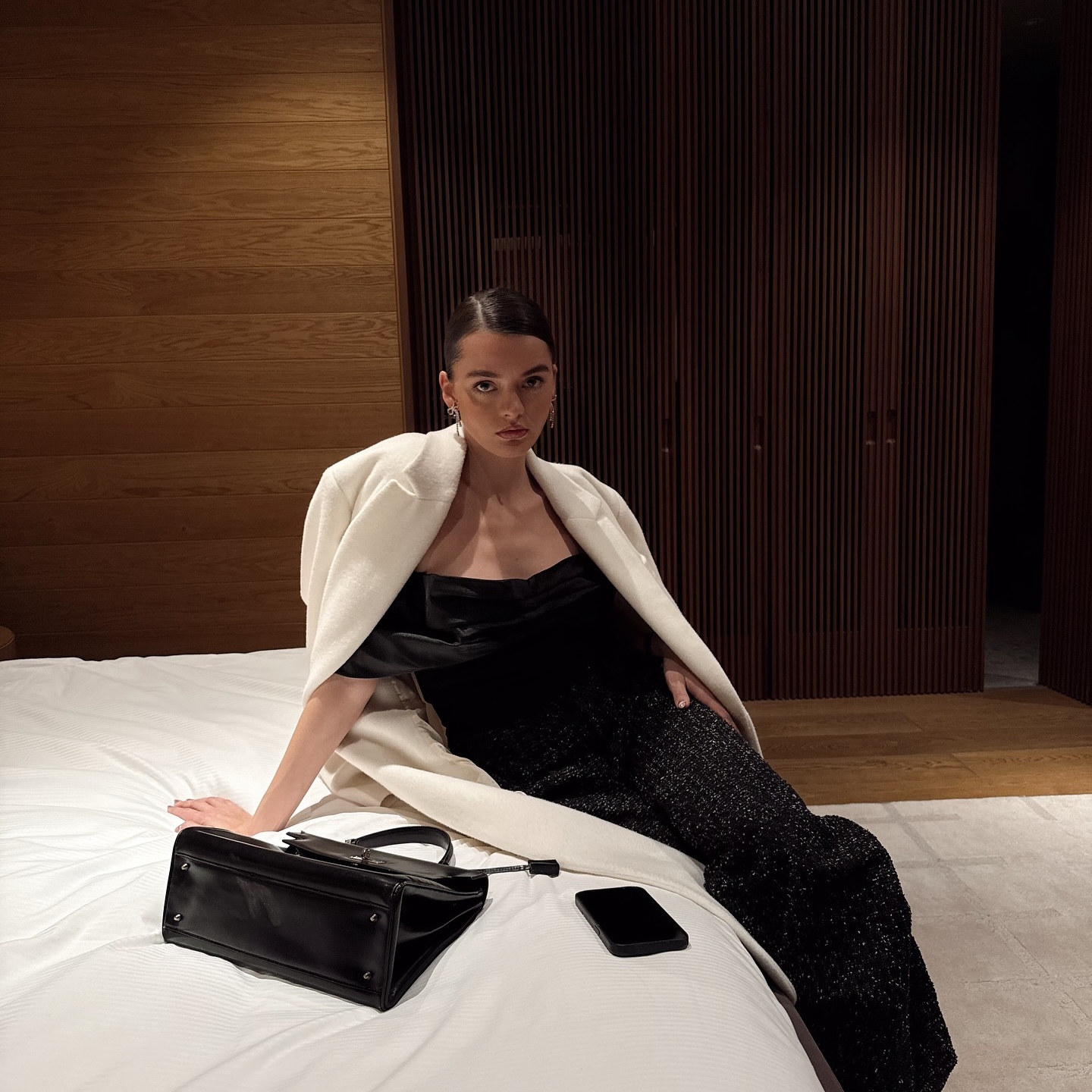 Mary L. Jean with a sleek bun and glowing complexion