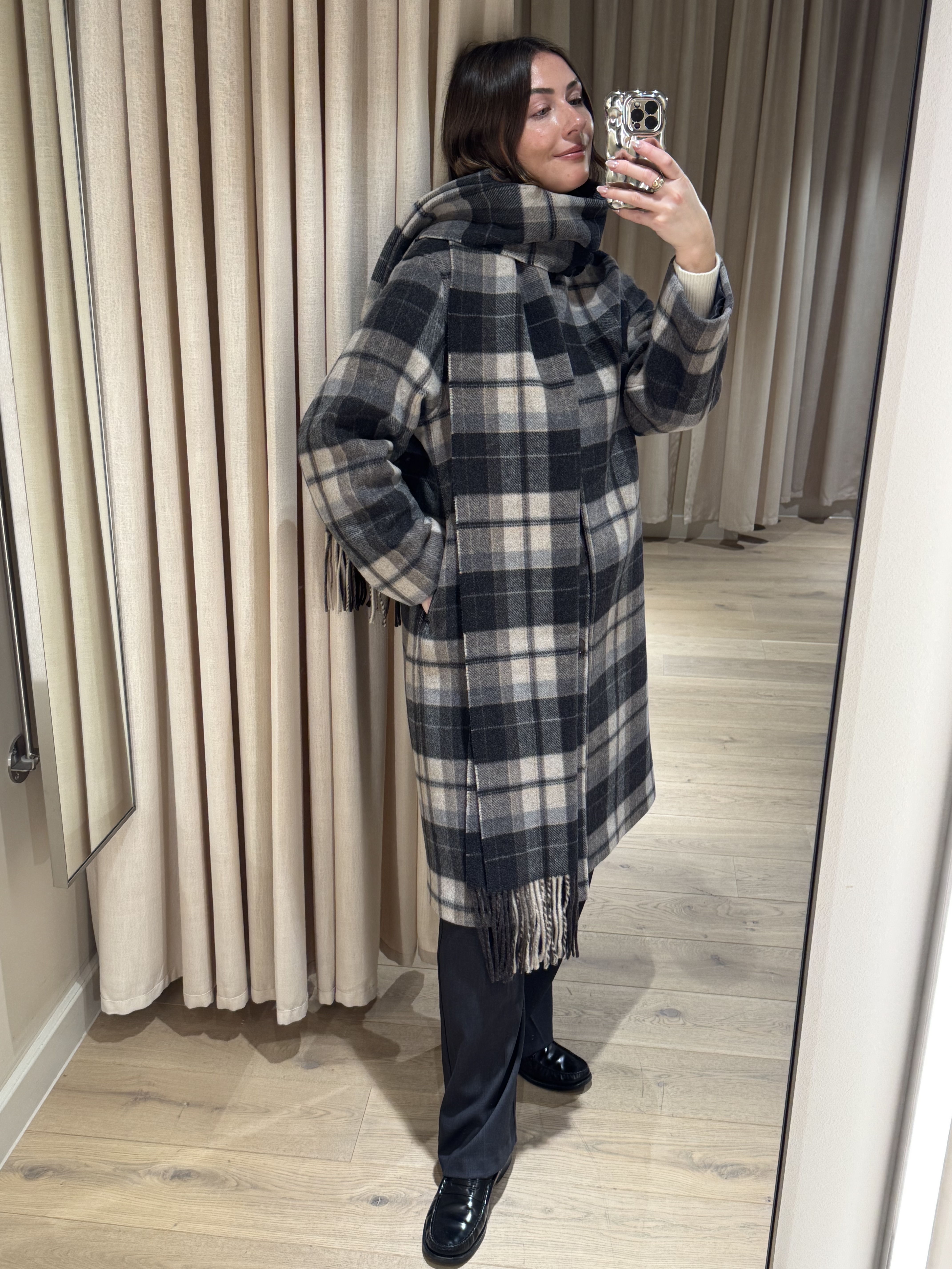 Sophie Robyn Watson wearing a coat from H&amp;amp;M.