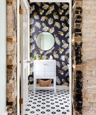 Peel and stick floral tile effect flooring in bathroom with contrast modern wallpaper