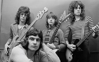 Derringer pose backstage at the Shaboo Inn in Willimantic, Connecticut, June 1976. (from left) bassist Kenny Aaronson, drummer Vinny Appice, Derringer and guitarist Danny Johnson