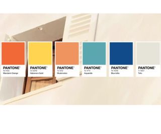 Nespresso X Pantone colorways in front of a villa