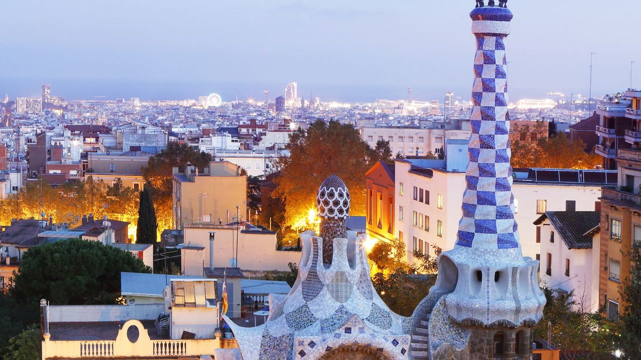 view from the park güell in barcelona by twilight