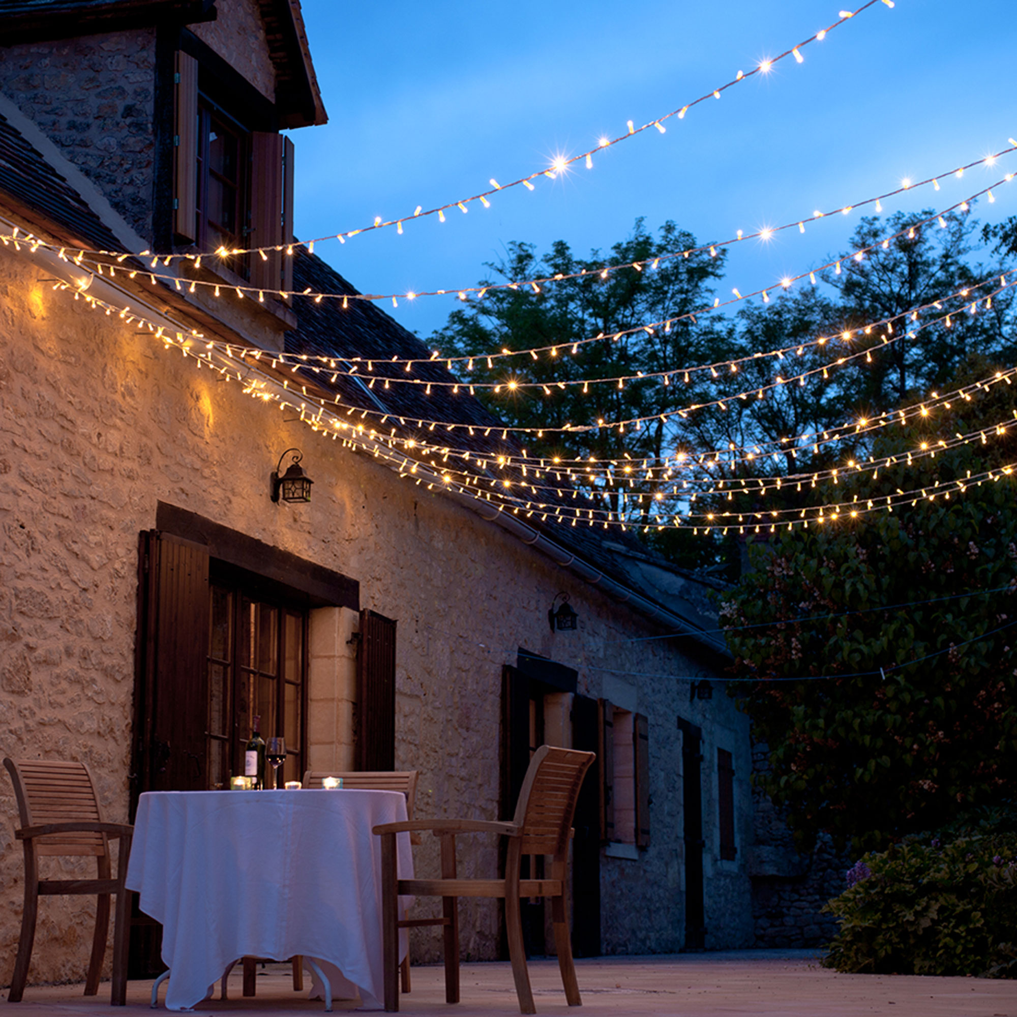 house with lighting and table and chair