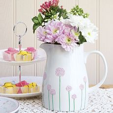 coloured flowers on jug ceramic vase