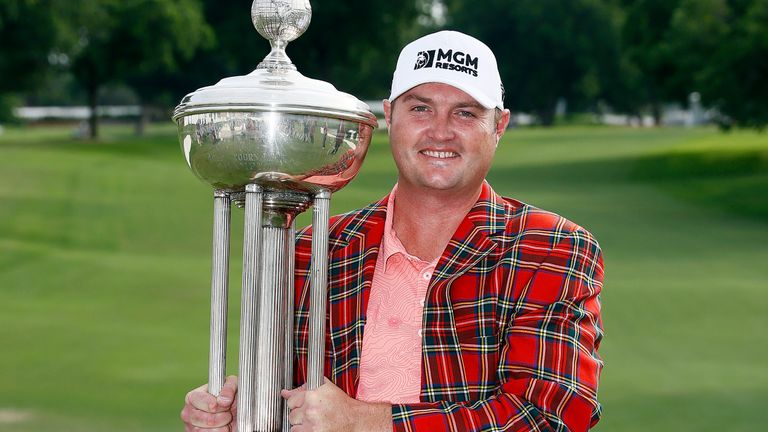 Jason Kokrak poses with the trophy after winning the 2021 Charles Schwab Challenge