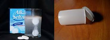 Alka Seltzer and empty plastic vial