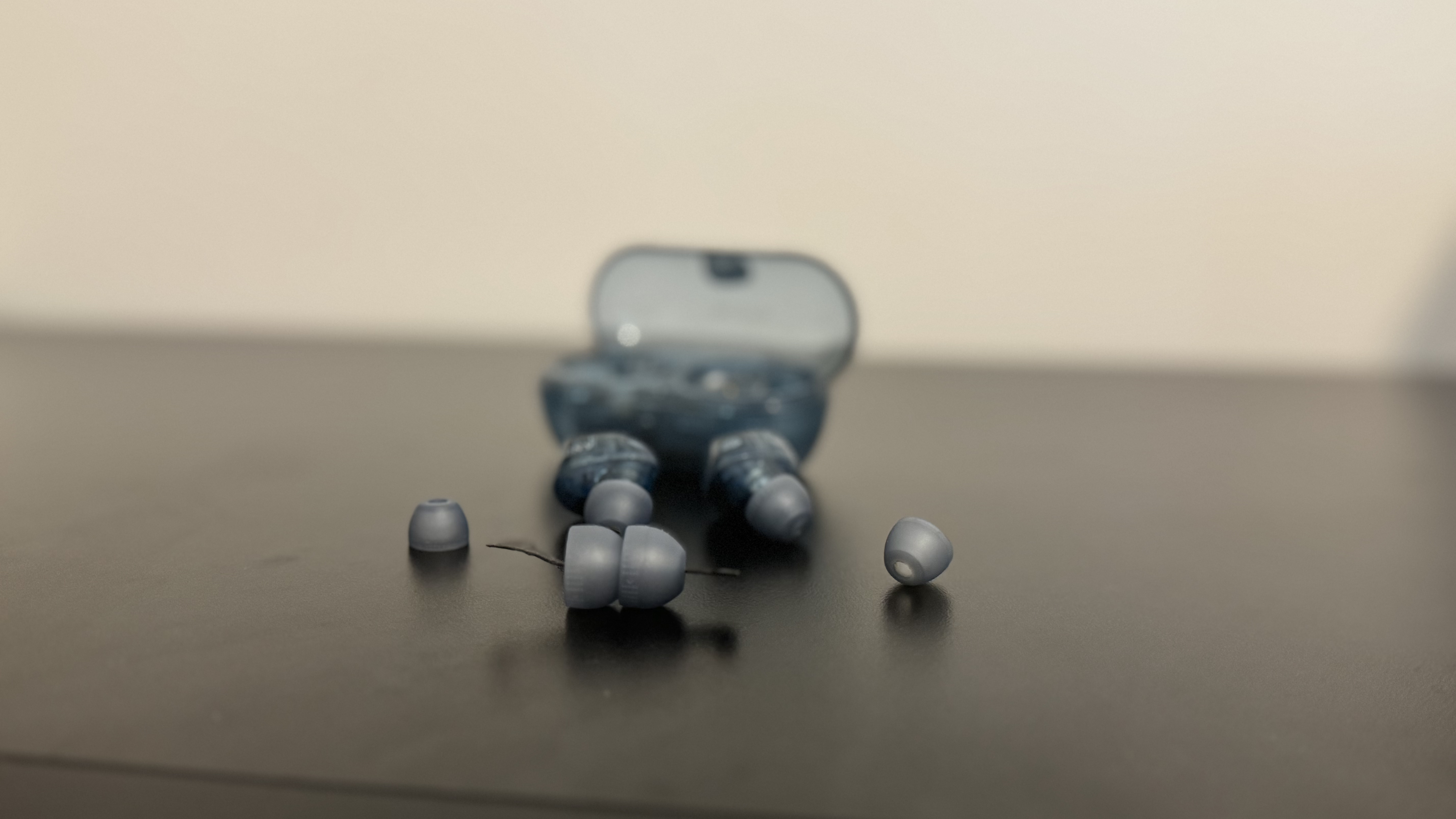 Sony WF-C710N earbuds and six rubber tips on a table