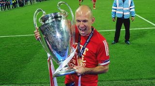 Arjen Robben celebrates with the Champions League trophy
