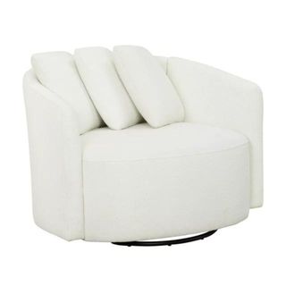 White accent chair with throw pillows