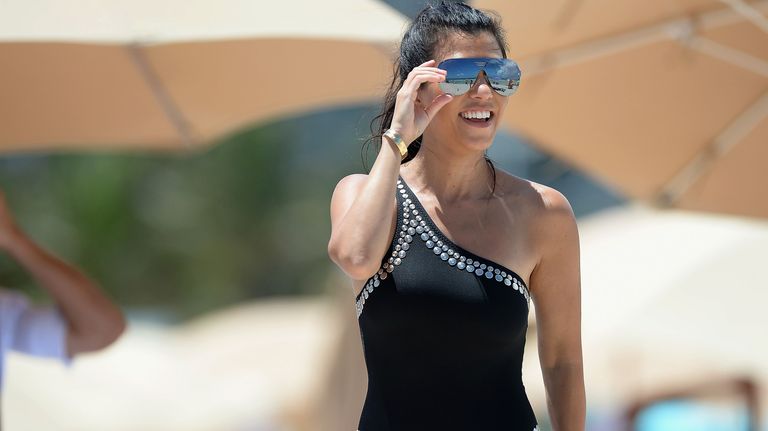 Sportswear, Swimwear, Leotard, One-piece swimsuit, Maillot, Chest, Goggles, Headpiece, Sleeveless shirt, Hair accessory,