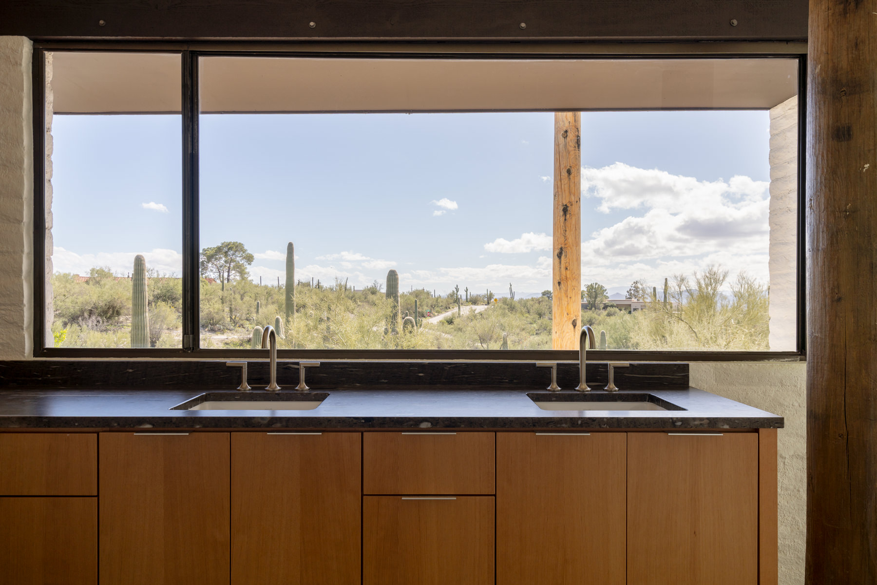 view of Ramada House by Judith Chafee, white, simple modernist house in the american desert