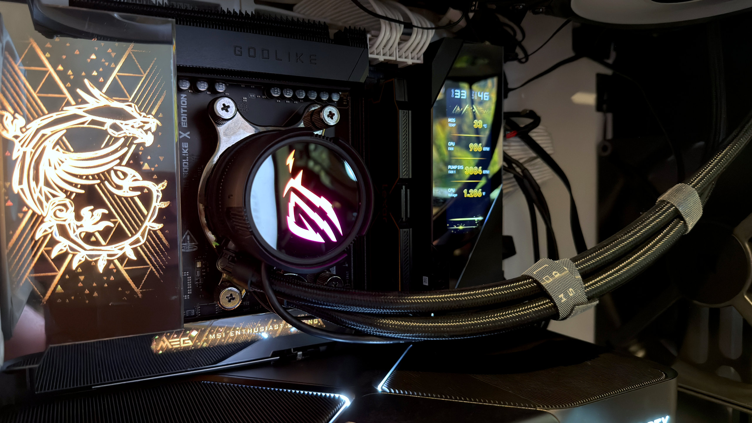 A photo of a high-end gaming PC's motherboard, showing multiple, expensive features, with a single DDR5 DIMM installed