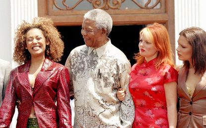 Despite the fashion choices, Mandela loved meeting the girls. 