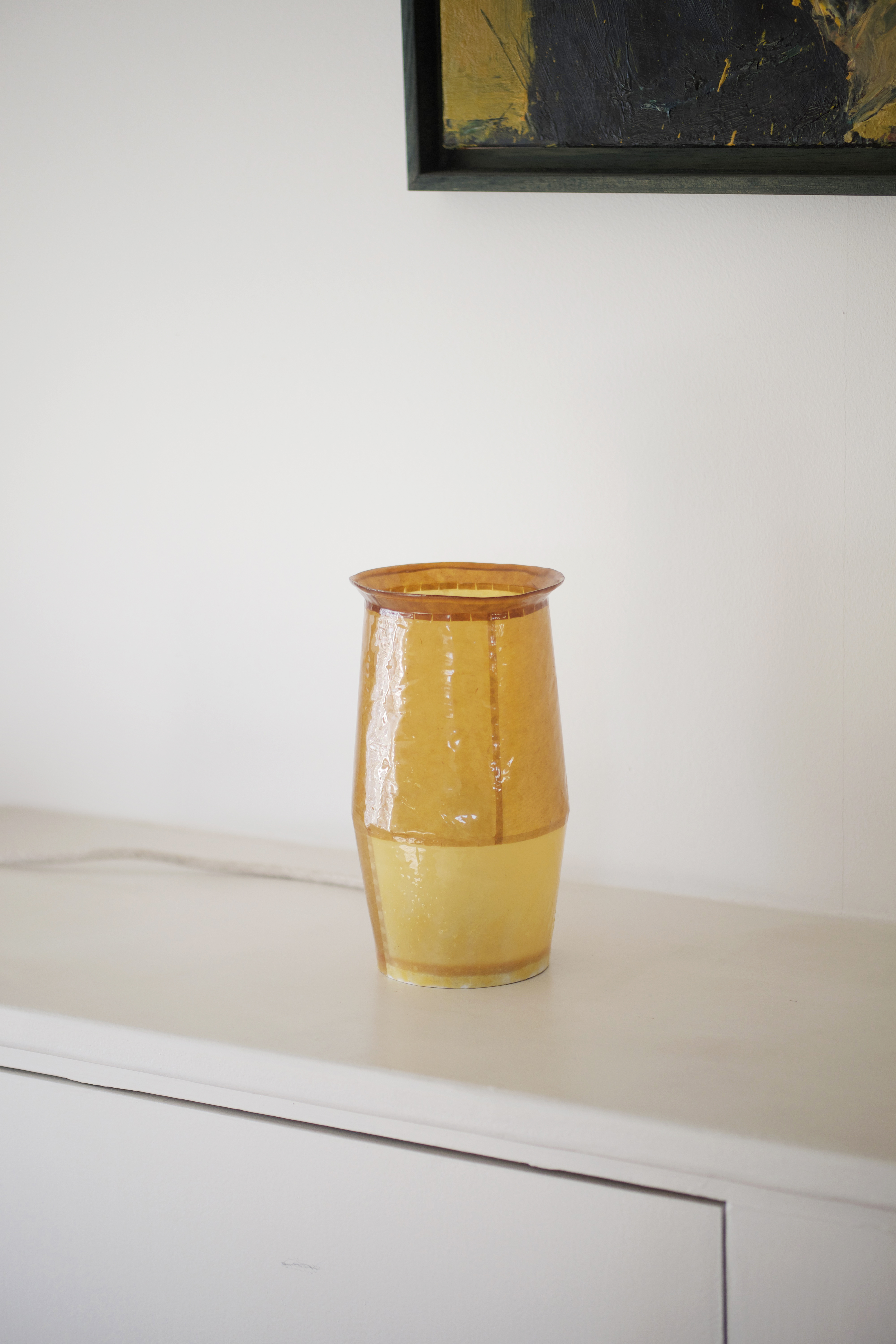 vessel made from translucent amber coloured resin
