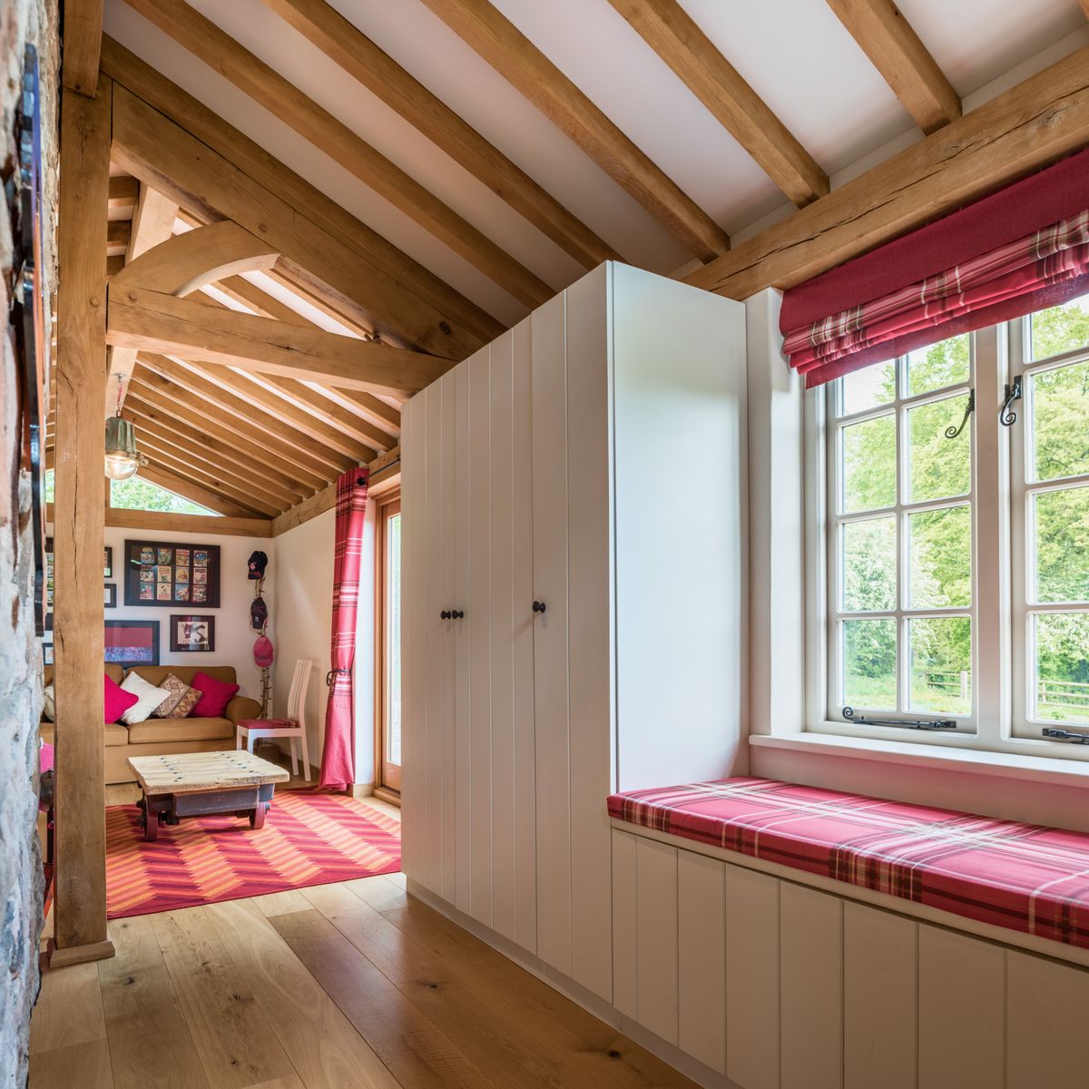 hallway in open plan cottage with window seat