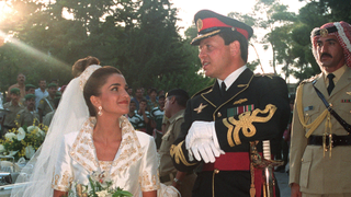 Prince Abdullah, the eldest son of Jordan's King Hussein, poses with his bride Rania Yassine, 28, after their wedding ceremony at the Royal Palace in Amman 10 June 1993. Prince Abdallah ascended the throne on the death of his father King Hussein 07 February 1999