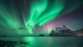 green streaks of northern lights