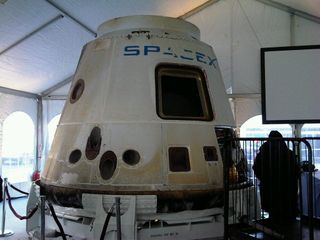 SpaceX showcased the company's flown Dragon space capsule at an event jointly hosted with Tesla Motors in Washington, D.C. on Feb. 10, 2011.