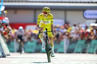 SUPERDEVOLUY LE DEVOLUY FRANCE JULY 17 Tadej Pogacar of Slovenia and UAE Team Emirates Yellow Leader Jersey crosses the finish line during the 111th Tour de France 2024 Stage 17 a 1778km stage from SaintPaulTroisChateaux to Superdevoluy 1500m UCIWT on July 17 2024 in Superdevoluy Le Devoluy France Photo by Dario BelingheriGetty Images