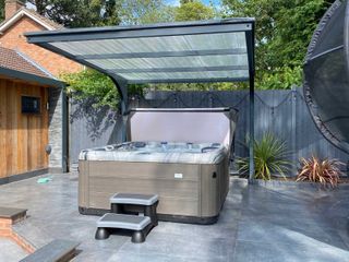 residential hot tub with cover by MySpa UK