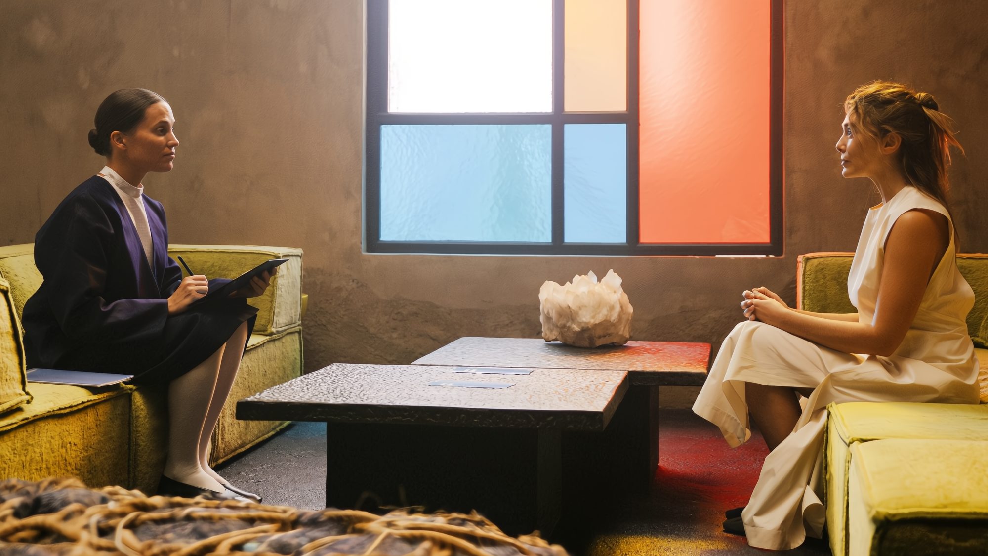 Alicia Vikander and Elizabeth Olsen in The Assessment