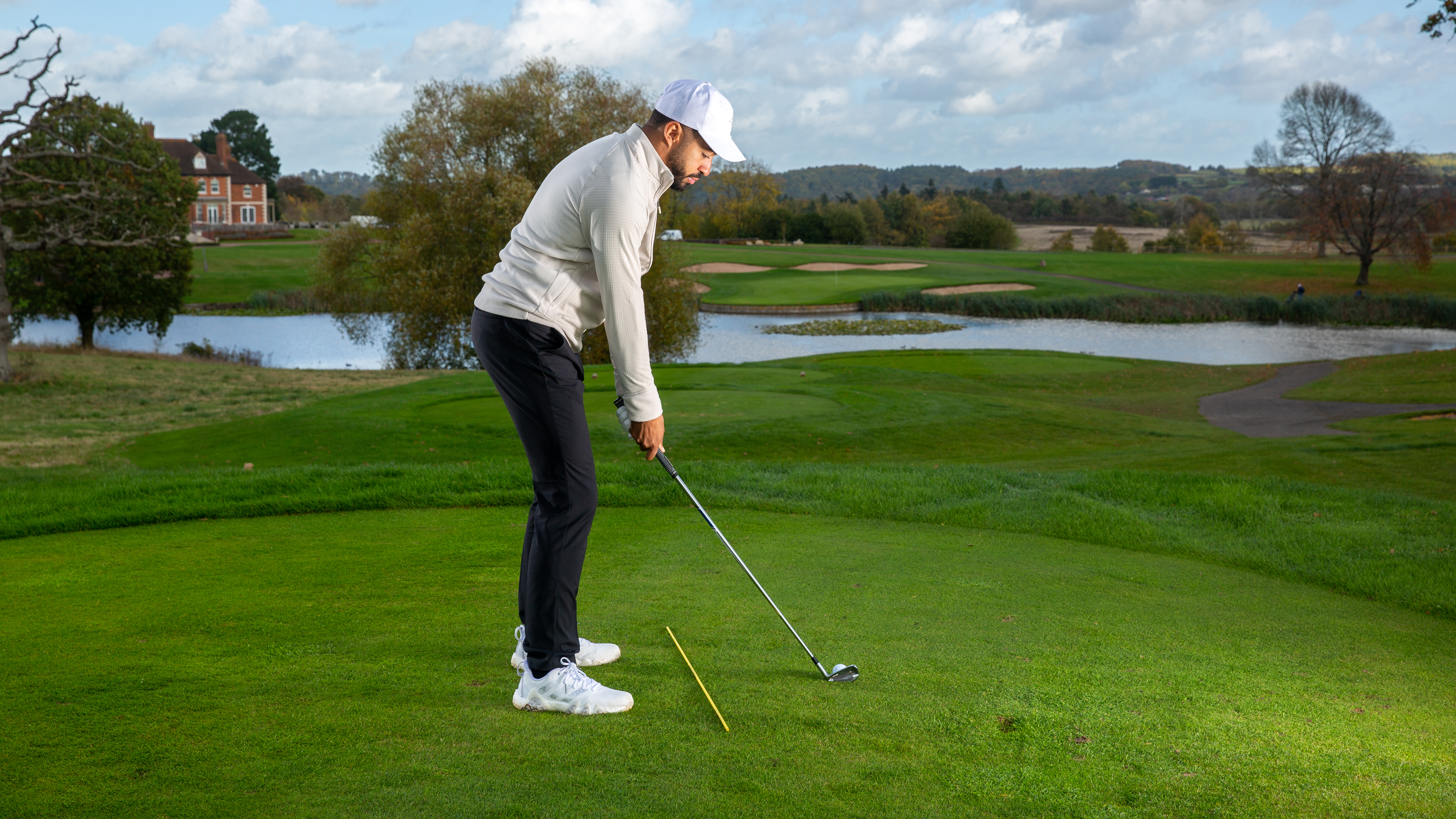 PGA pro Trey Niven setting up to hit a shot to the 18th at The Astbury Golf Resort