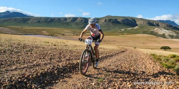 Christoph Sauser charges to a record-breaking overall victory.