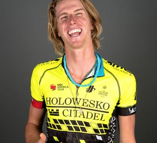 TJ Esienhart shows off the 2018 Holowesko-Citadel jersey