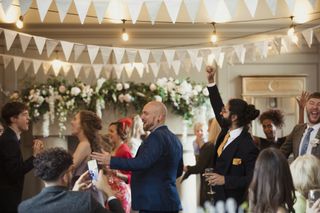 wedding guests dancing at a wedding