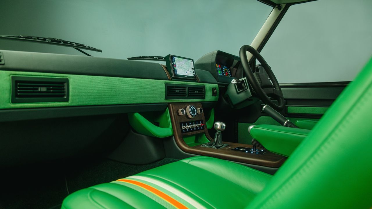 Details of the new Lunaz Range Rovers. One is very green, the other is still green but not as much. Both are nice.
