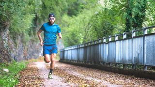 Man running along a path